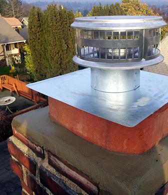 refinished chimney liner and cap/spark arrestor